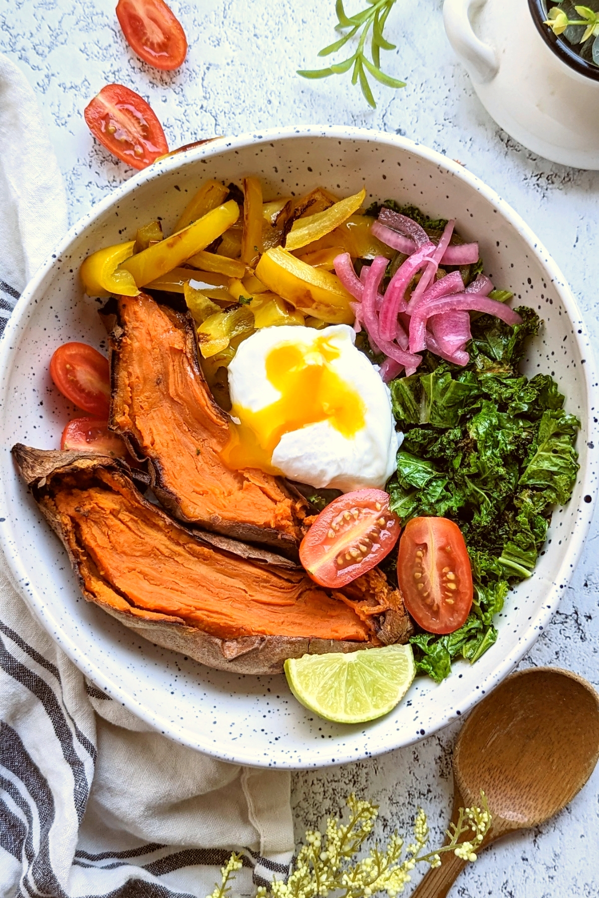 sweet potato breakfast recipes with eggs vegetables and fresh tomatoes and lime juice for a healthy clean eating breakfast idea.