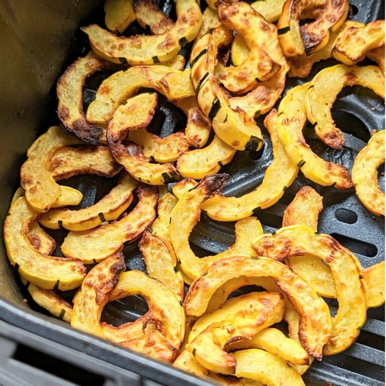 delicata squash air fryer recipe tossed with oil salt and pepper